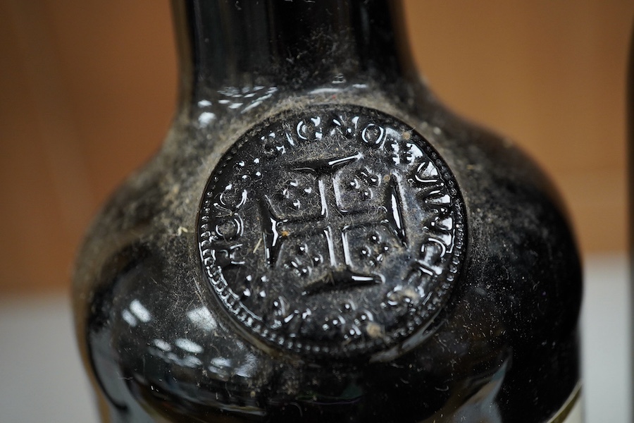 A bottle of Fonseca's vintage port 1963 and a bottle of Porto Ramos Pinto (10 years). Condition - storage unknown, appears good other than some wear